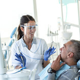 dentist explaining treatment to patient