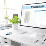 dental insurance form on desktop in office